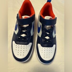 Nike Kids' Navy and White Sneakers with Orange Accents